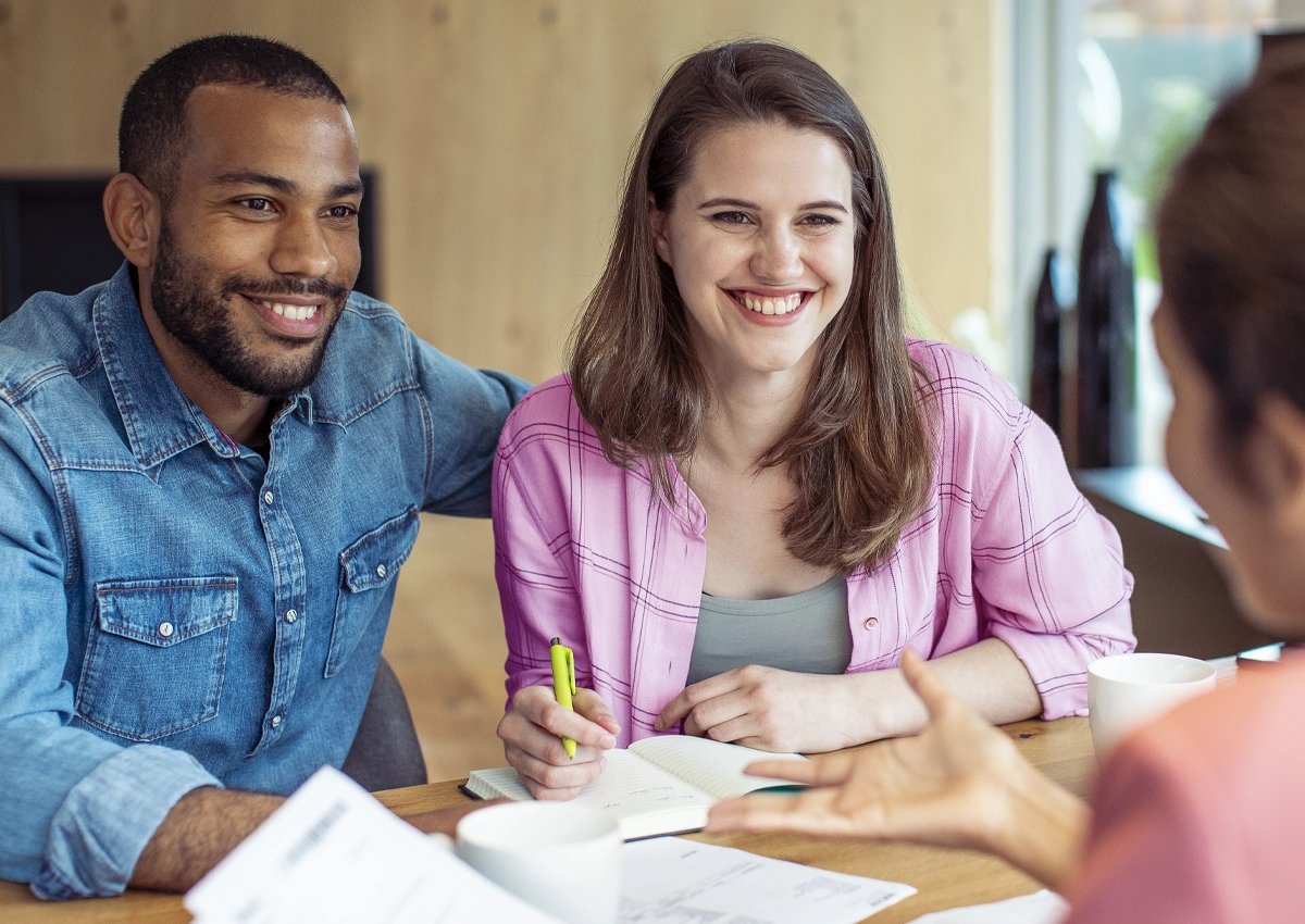 Two people get financial guidance and personalized support.