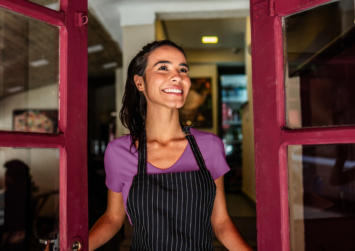 Person smiling and confident about her financial health.