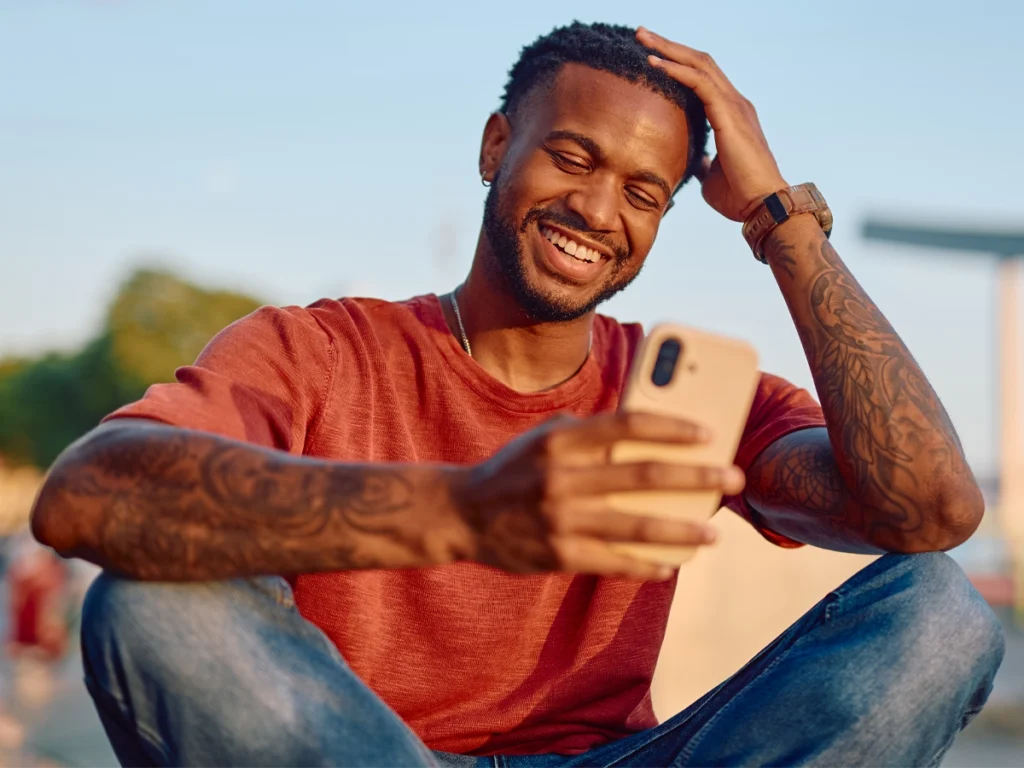 Person reflecting on financial goals with support from digital coaching.